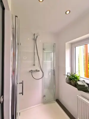 Ein Badezimmer in der Unterkunft DAS Ferienhaus Waldblick