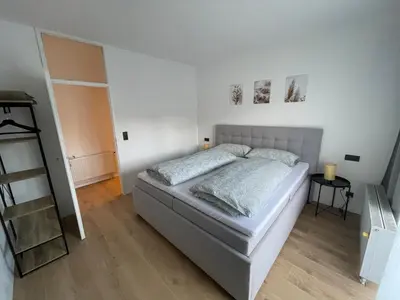 Ein Bett oder Betten in einem Zimmer der Unterkunft Fundis Apartment
