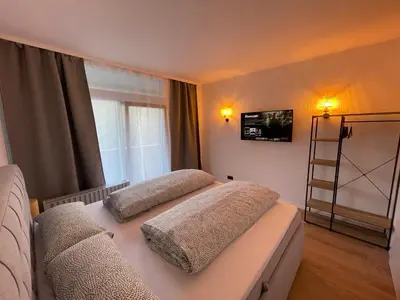 Ein Bett oder Betten in einem Zimmer der Unterkunft Fundis Apartment