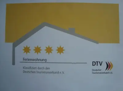 Ein Zertifikat, Auszeichnung, Logo oder anderes Dokument, das in der Unterkunft Ferienwohnung Waldfried ausgestellt ist