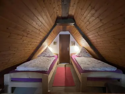 Ein Bett oder Betten in einem Zimmer der Unterkunft Gemütliches kleines Ferienhäuschen Nr. 3 im Harz für 2 Personen (inkl. Balkon)