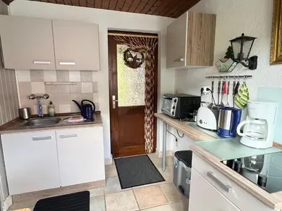 Küche/Küchenzeile in der Unterkunft Gemütliches kleines Ferienhäuschen Nr. 3 im Harz für 2 Personen (inkl. Balkon)