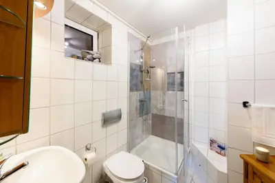 Ein Badezimmer in der Unterkunft 