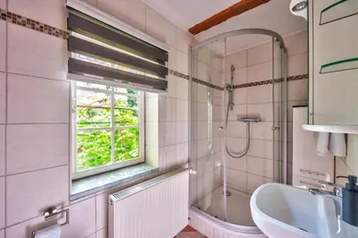 Ein Badezimmer in der Unterkunft 