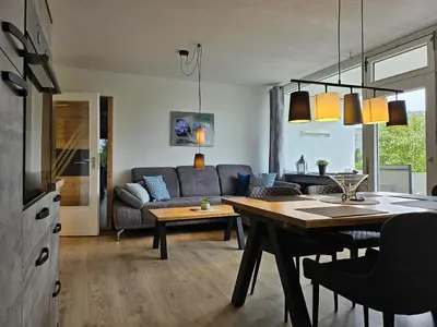 Ein Sitzbereich in der Unterkunft Familienwohnung Grünwald