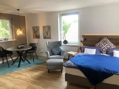 Ein Bett oder Betten in einem Zimmer der Unterkunft Gipfelstation