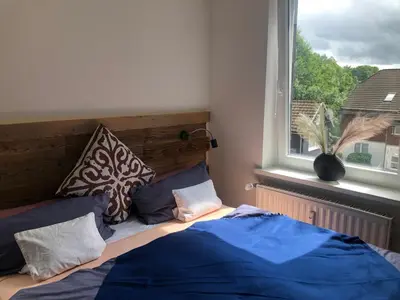 Ein Bett oder Betten in einem Zimmer der Unterkunft Gipfelstation