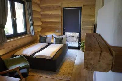 Ein Sitzbereich in der Unterkunft Tiefenbach-Chalet