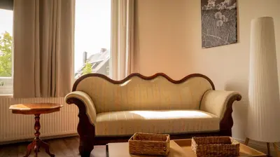 Ein Sitzbereich in der Unterkunft Apartment Pusteblume