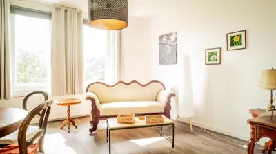 Ein Sitzbereich in der Unterkunft Apartment Pusteblume