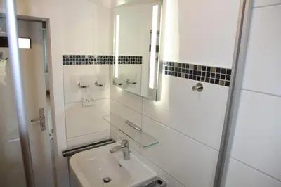 Ein Badezimmer in der Unterkunft Wohnung Julius 8