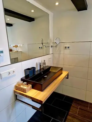 Ein Badezimmer in der Unterkunft Ferienhaus Am Brunnen