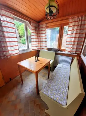 Ein Sitzbereich in der Unterkunft Romantischer Bungalow mit schönem Ausblick