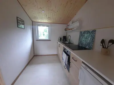 Küche/Küchenzeile in der Unterkunft Romantischer Bungalow mit schönem Ausblick