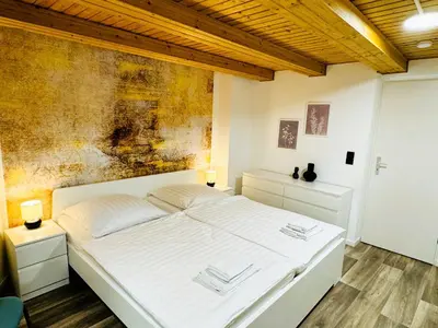 Ein Bett oder Betten in einem Zimmer der Unterkunft FeWo Lucas im Haus HarzGlück