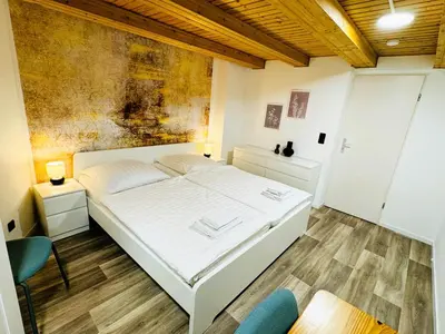 Ein Bett oder Betten in einem Zimmer der Unterkunft FeWo Lucas im Haus HarzGlück