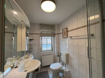 Ein Badezimmer in der Unterkunft gina stay - Apartmenthaus im Zentrum von Quedlinburg
