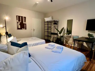 Ein Bett oder Betten in einem Zimmer der Unterkunft gina stay - Apartmenthaus im Zentrum von Quedlinburg