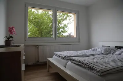 Ein Bett oder Betten in einem Zimmer der Unterkunft Gästewohnung Heinrich-Heine-Straße 8