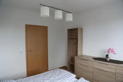 Ein Bett oder Betten in einem Zimmer der Unterkunft Gästewohnung Heinrich-Heine-Straße 8