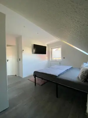 Ein Bett oder Betten in einem Zimmer der Unterkunft Ferienwohnung Harztraum