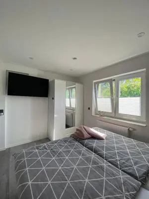 Ein Bett oder Betten in einem Zimmer der Unterkunft Ferienwohnung Harztraum