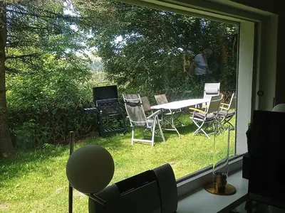 Ein Garten an der Unterkunft Ferienwohnung Merlina WLAN-Wandern-Radfahren-Motoradurlaub