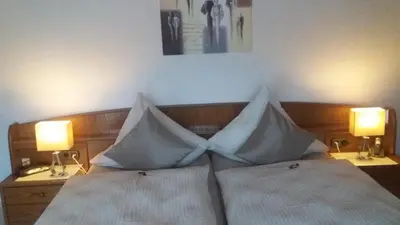 Ein Bett oder Betten in einem Zimmer der Unterkunft Ferienwohnungen Hasenpatt