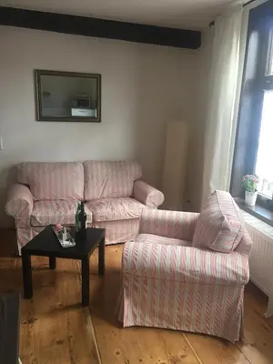 Ein Sitzbereich in der Unterkunft Kaufmannshaus Anno 1613