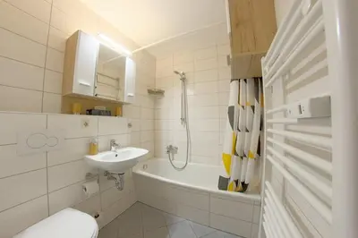 Ein Badezimmer in der Unterkunft Apartment 454