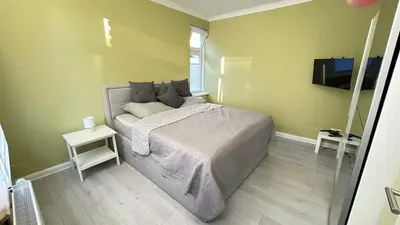 Ein Bett oder Betten in einem Zimmer der Unterkunft Ferienhaus Am Trollmönch