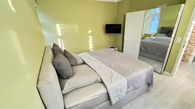 Ein Bett oder Betten in einem Zimmer der Unterkunft Ferienhaus Am Trollmönch