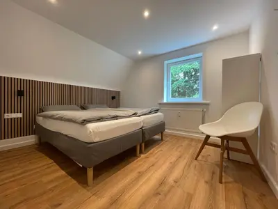 Ein Bett oder Betten in einem Zimmer der Unterkunft Harz Escape