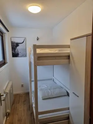 Ein Bett oder Betten in einem Zimmer der Unterkunft Braunlage Glück