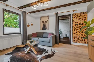 Ein Sitzbereich in der Unterkunft HIRSCH Stadt Apartment 6 - Balkon mit Flussblick - Parkplatz