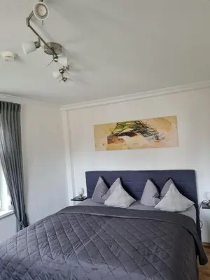Ein Bett oder Betten in einem Zimmer der Unterkunft Harz-Stübchen
