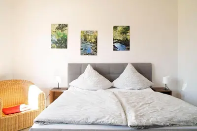 Ein Bett oder Betten in einem Zimmer der Unterkunft RuDi Ferienwohnung 