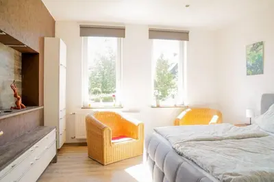 Ein Bett oder Betten in einem Zimmer der Unterkunft RuDi Ferienwohnung 
