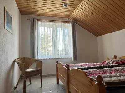 Ein Bett oder Betten in einem Zimmer der Unterkunft Ferienwohnung am Lehof