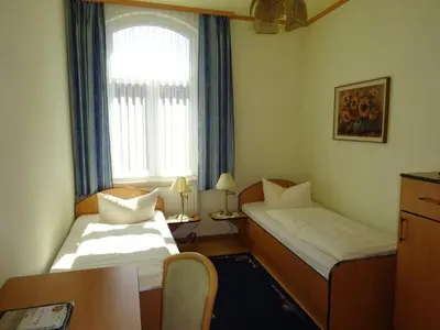 Ein Bett oder Betten in einem Zimmer der Unterkunft Hotel zur Krone