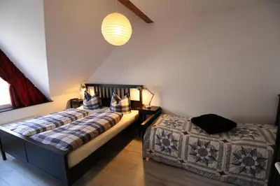 Ein Bett oder Betten in einem Zimmer der Unterkunft Ferienapartments am Brocken