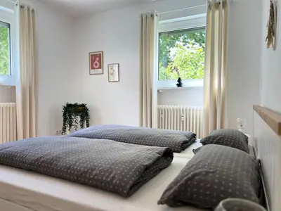 Ein Bett oder Betten in einem Zimmer der Unterkunft Apartments-Bad Harzburg, Zentrale Ferienwohnung