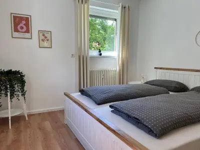 Ein Bett oder Betten in einem Zimmer der Unterkunft Apartments-Bad Harzburg, Zentrale Ferienwohnung