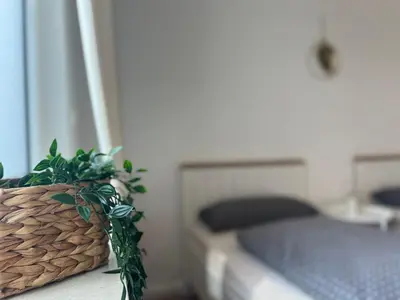Ein Bett oder Betten in einem Zimmer der Unterkunft Apartments-Bad Harzburg, Zentrale Ferienwohnung