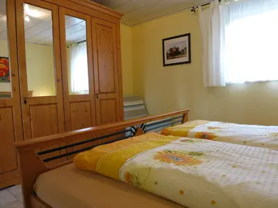 Ein Bett oder Betten in einem Zimmer der Unterkunft Bungalow am Osterteich