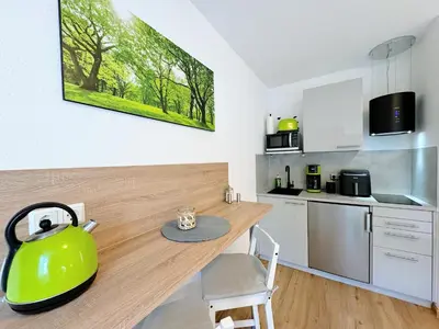 Küche/Küchenzeile in der Unterkunft REGIOHOTEL Harzresidenz Wernigerode - #Familienfreundlich #FrischRenoviert #Waschmaschine #FreeParking