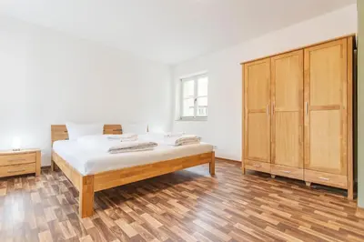 Ein Bett oder Betten in einem Zimmer der Unterkunft Alte Apotheke