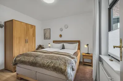 Ein Bett oder Betten in einem Zimmer der Unterkunft HIRSCH Stadt Apartment 3 - Balkon mit Flussblick - Parkplatz