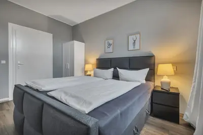 Ein Bett oder Betten in einem Zimmer der Unterkunft HIRSCH Apartment Luchs - zentral - modern - groß