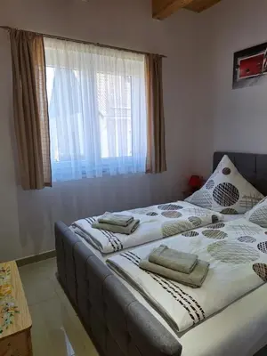 Ein Bett oder Betten in einem Zimmer der Unterkunft Sonnenhof Haus 2 - EG